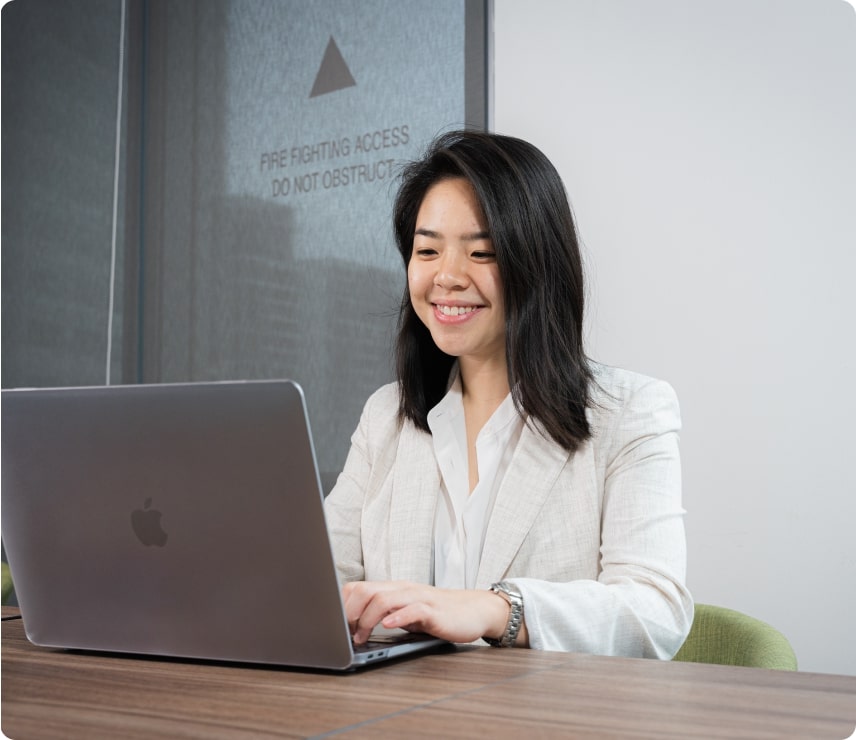 SEM specialist working on laptop