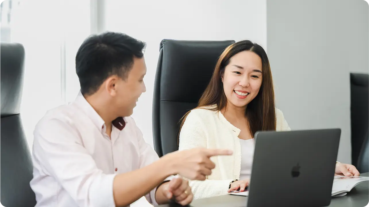 Technical SEO specialists discussing audit results