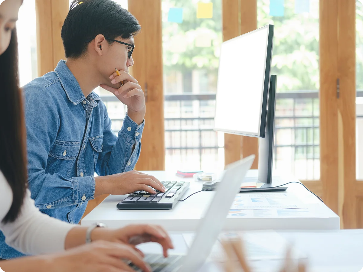 Web developers working at a website development company.