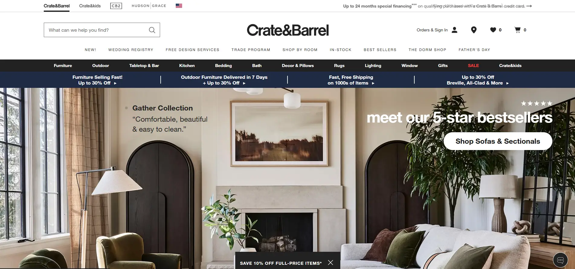 Crate & Barrel ecommerce homepage with styled living room layout